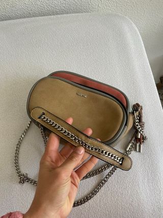 Bolso parfois la crwmallera central se abre mal