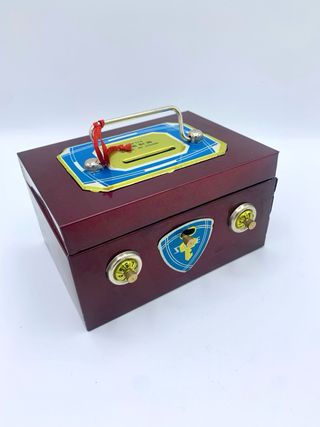 Grazioso salvadanaio vintage in latta