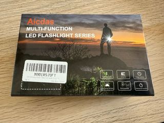 Linterna frontal con estuche y luz de lectura