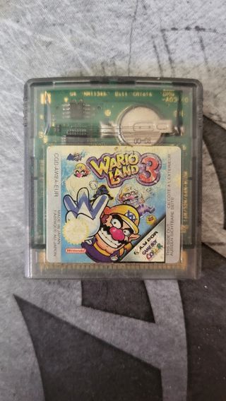 Gameboy Advance, cargador original y juegos.