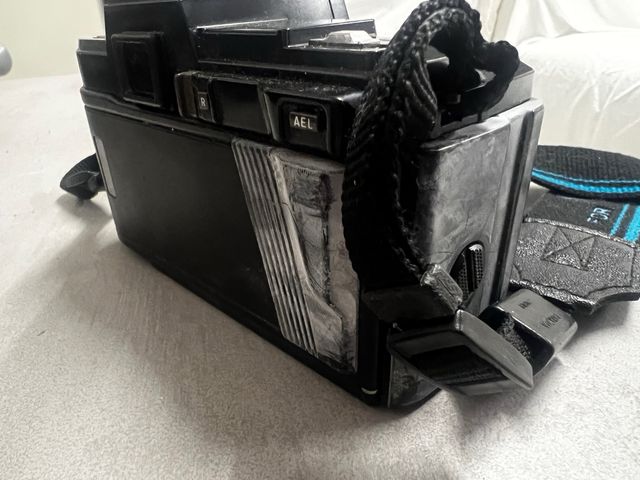 Objetivo Minolta 28 135