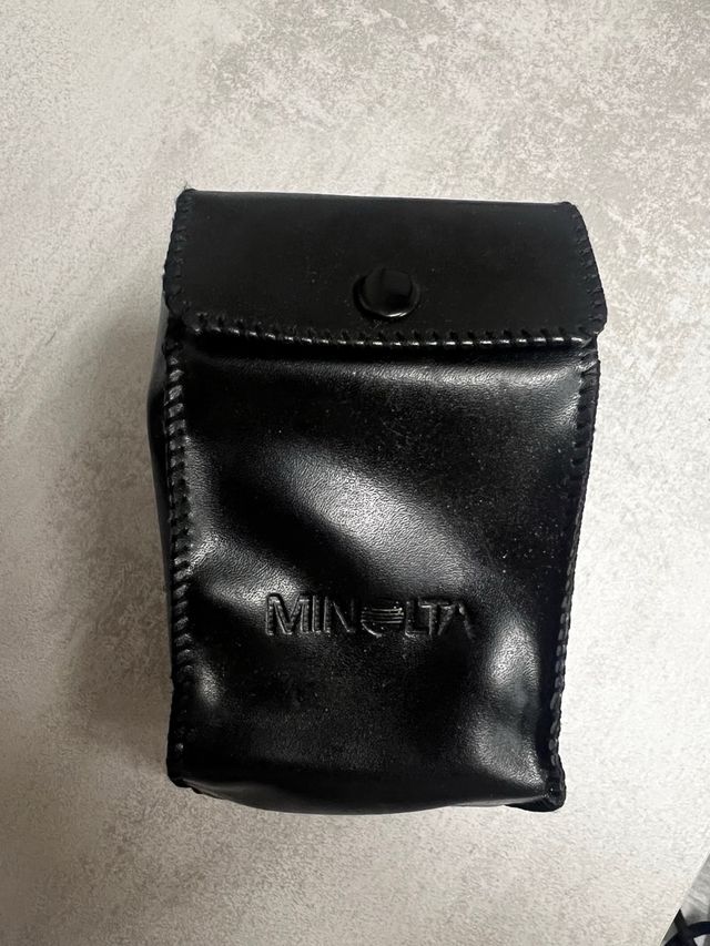 Objetivo Minolta 28 135