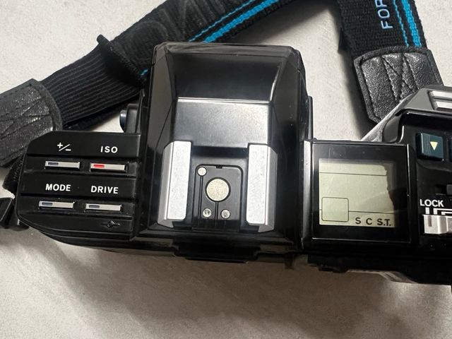 Objetivo Minolta 28 135