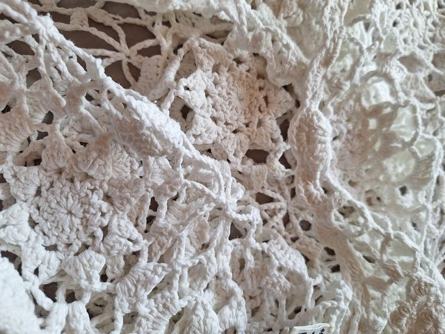 Vestido mini de crochet blanco.