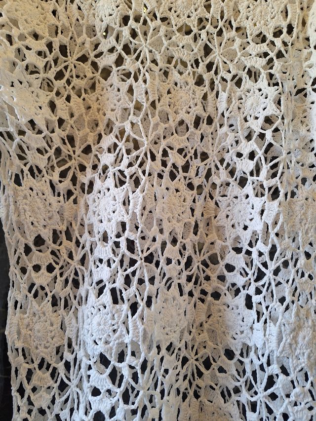 Vestido mini de crochet blanco.