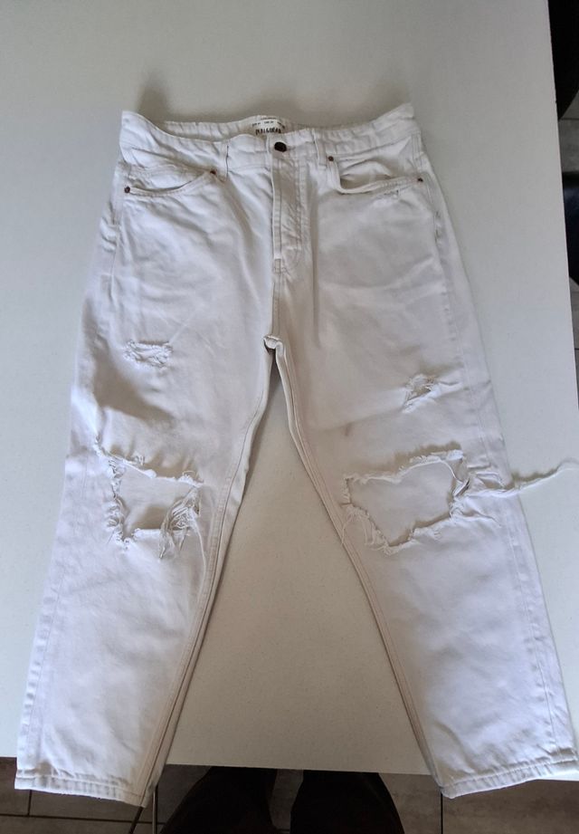 Jeans uomo con strappi