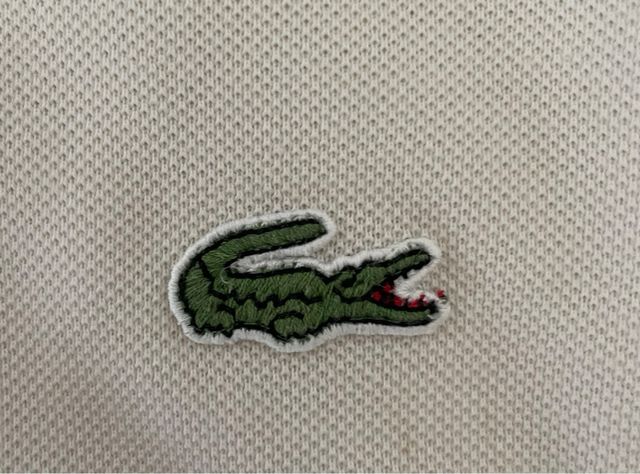 Polo Lacoste bianca a maniche corte