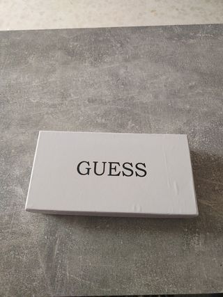 Cartelera Guess 