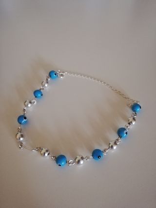 Pulsera de plata ojos azules