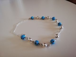 Pulsera de plata ojos azules