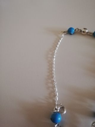 Pulsera de plata ojos azules