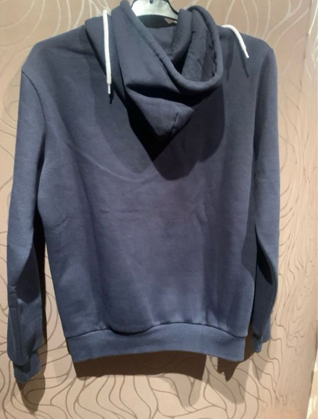 Sudadera y polo Champion