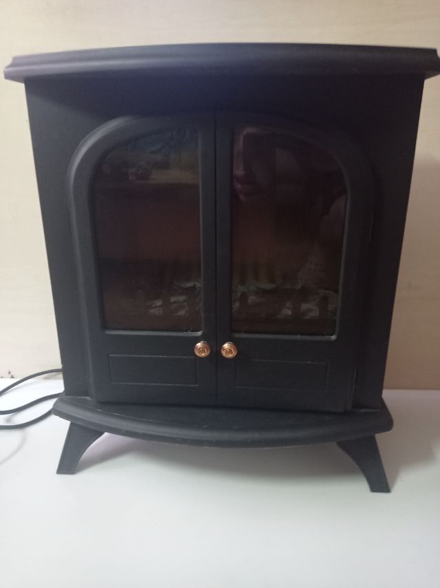 Estufa eléctrica calefatable estilo chimenea
