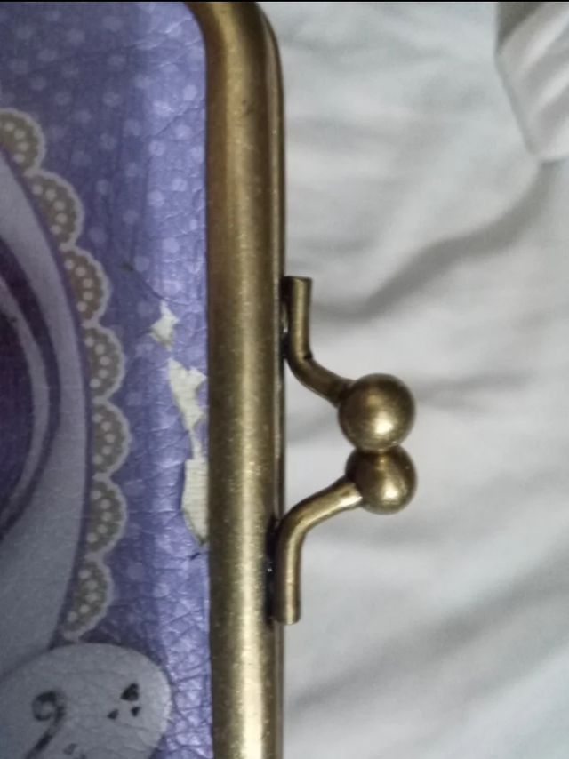 Pochette e portamonete Santoro Gorjuss