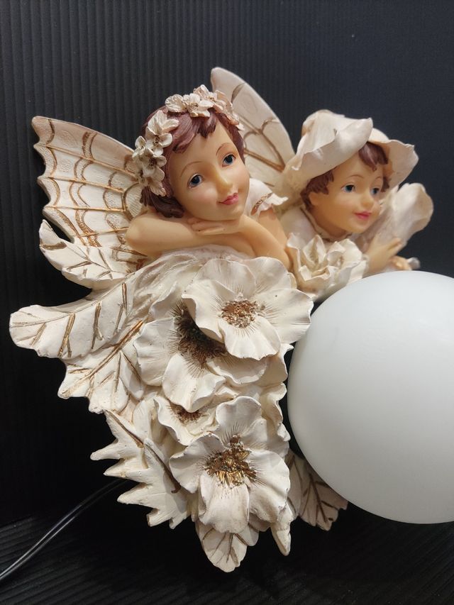 Aplique vintage con figura de niños.