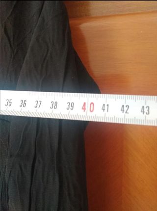 Blusa negra sin mangas vestir semitransparente