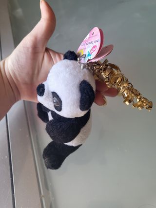 Peluche panda con etichetta