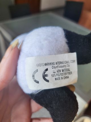 Peluche panda con etichetta