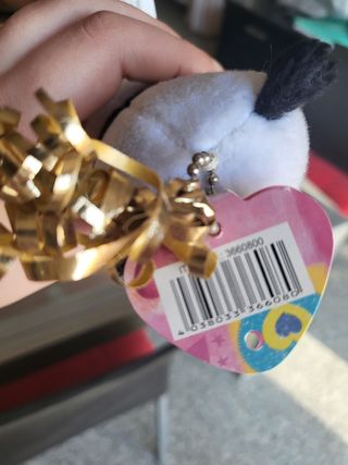 Peluche panda con etichetta