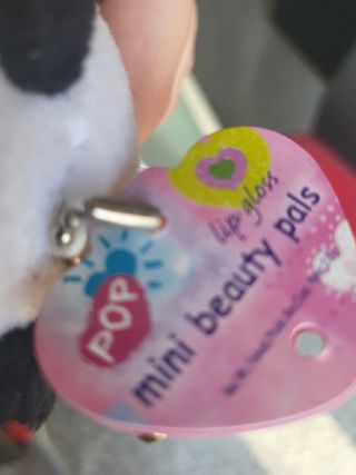 Peluche panda con etichetta