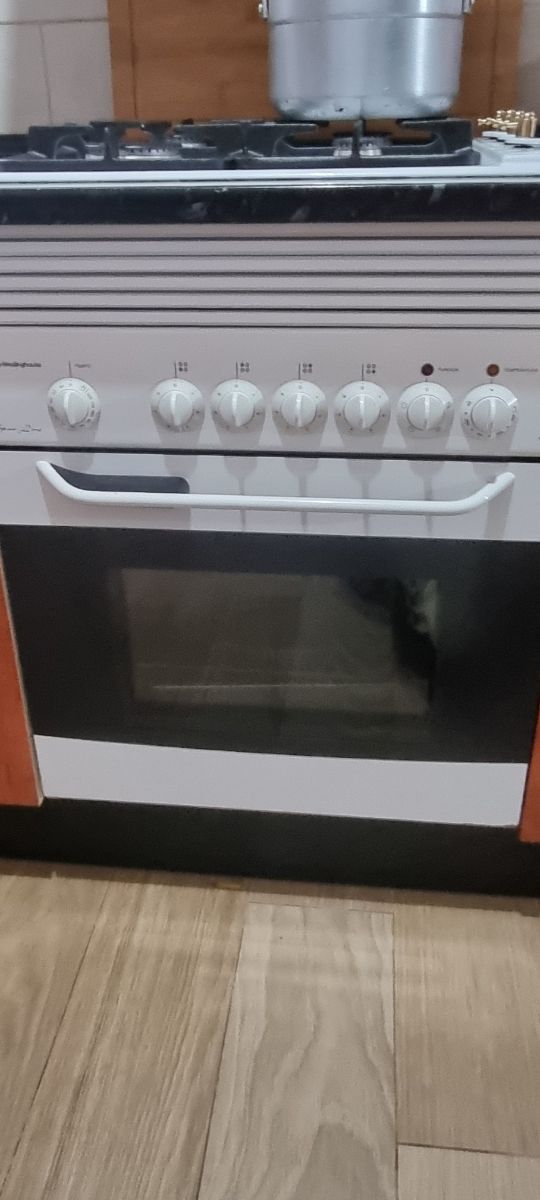 Placa de gas y horno eléctrico