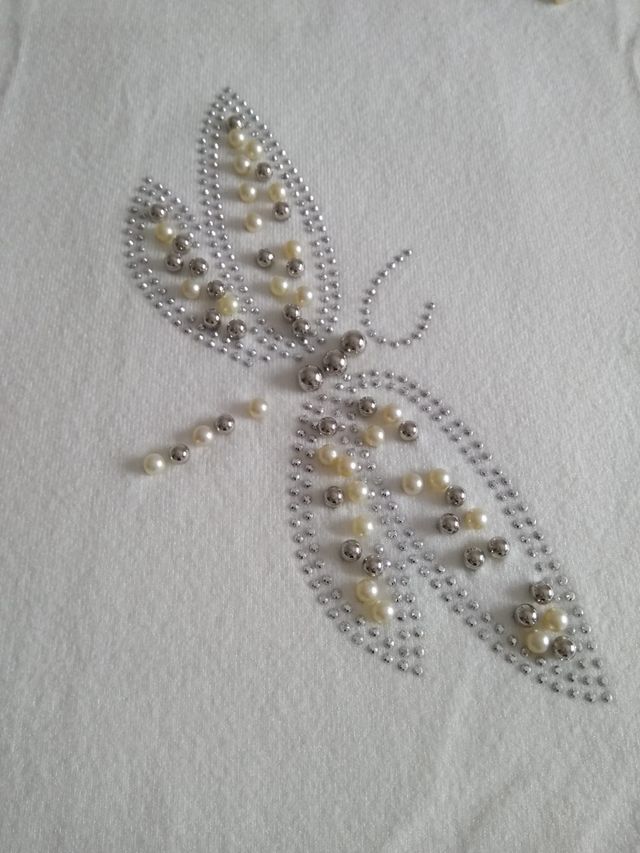 Jersey mariposas de perlas plateadas