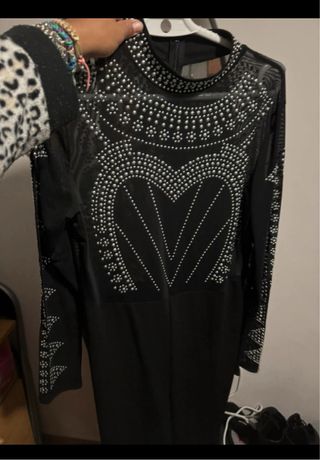 mono negro de vestir 