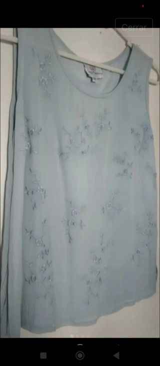 Bonita blusa en color celeste,