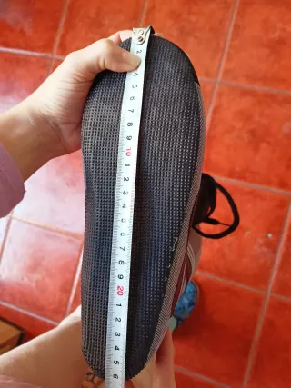 Par de botas de esquí + funda de transporte.