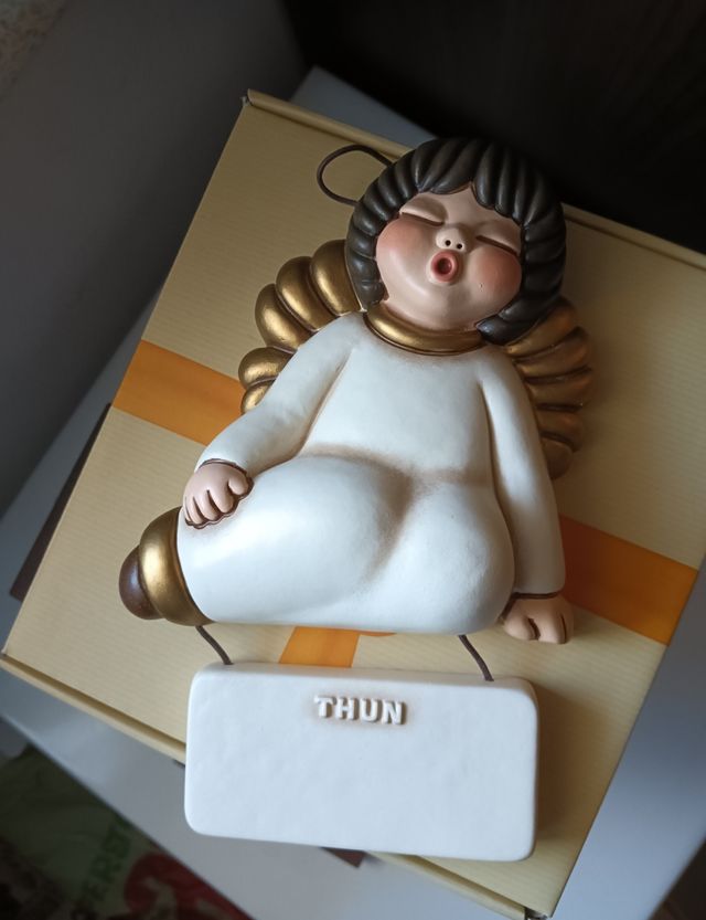 Formella angelo con targhetta Thun