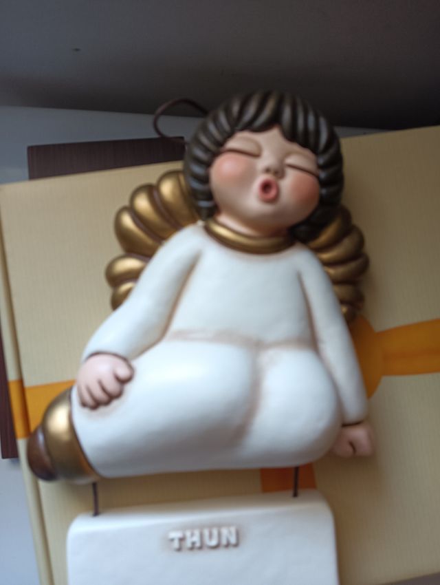 Formella angelo con targhetta Thun