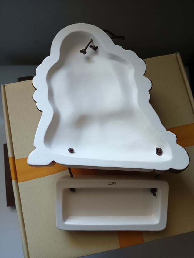 Formella angelo con targhetta Thun