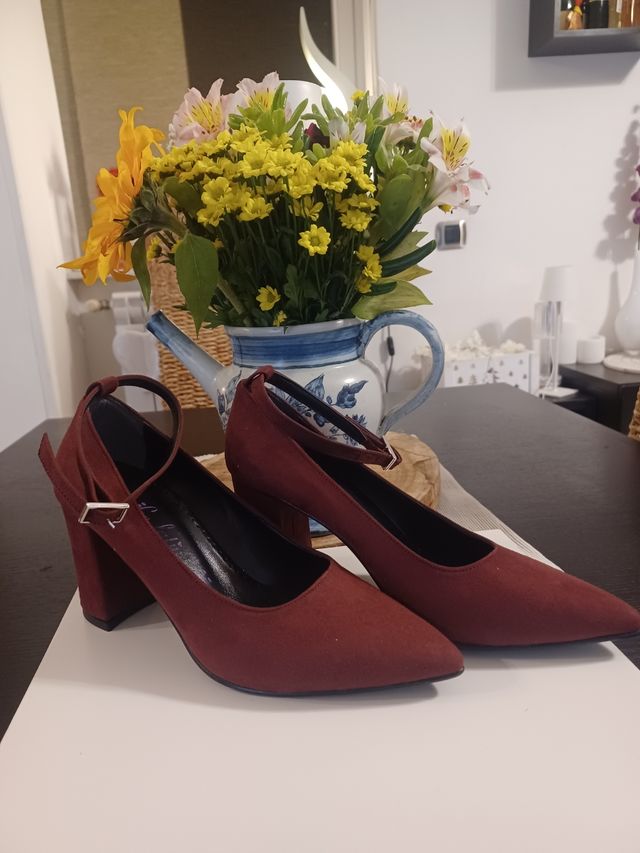 Décolleté donna con cinturino