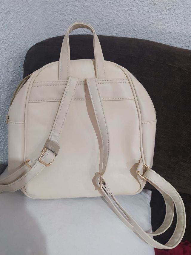 Mochila crema pequeña