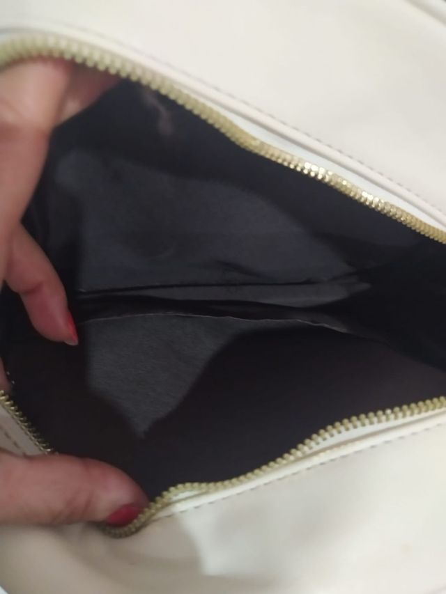 Mochila crema pequeña