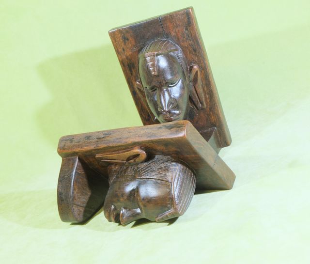 Reggilibri in legno esotico durissimo