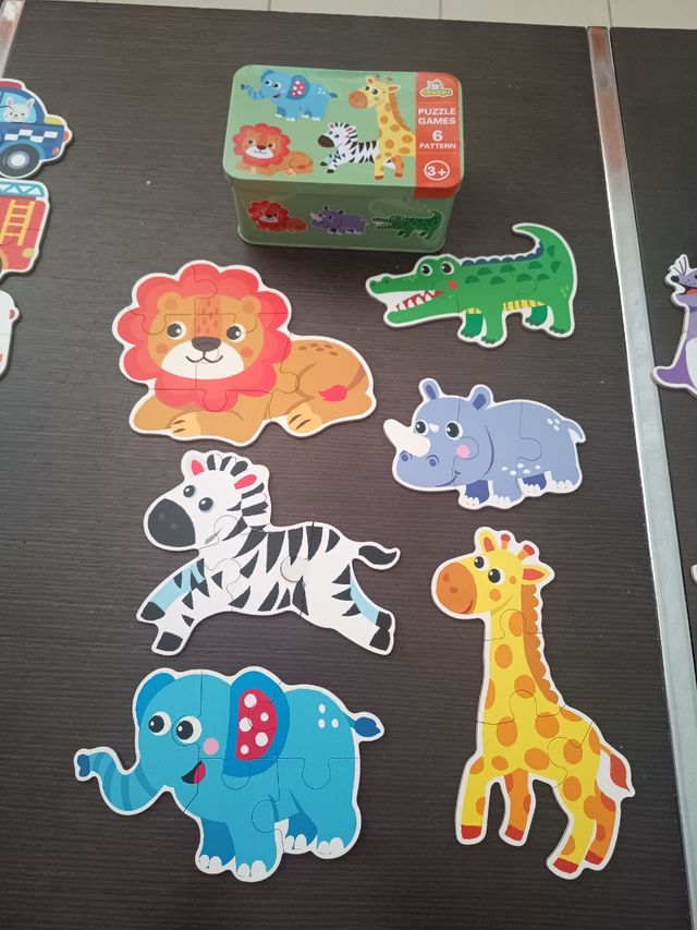 Lote 3 latas puzzles evolutivos. animales y vehícu