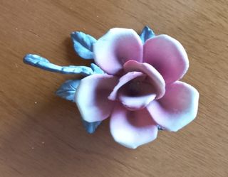 Portacandela a forma di rosa con manico