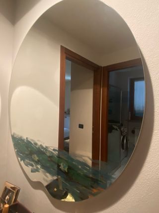 Specchio con ninfee di Monet