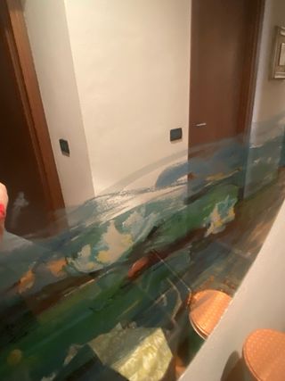 Specchio con ninfee di Monet