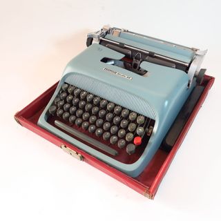 Maquina de escribir olibetti studio 44