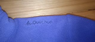 Sudadera morada con rosa marca Quechua