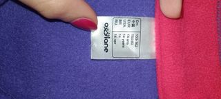 Sudadera morada con rosa marca Quechua