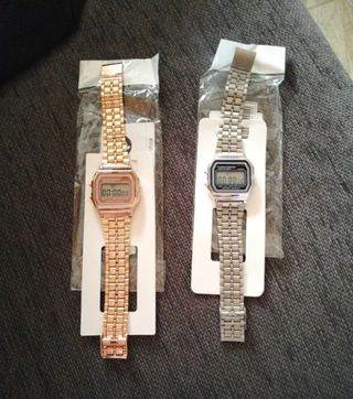 2 relojes nuevos,uno plateado y otro dorado rosado