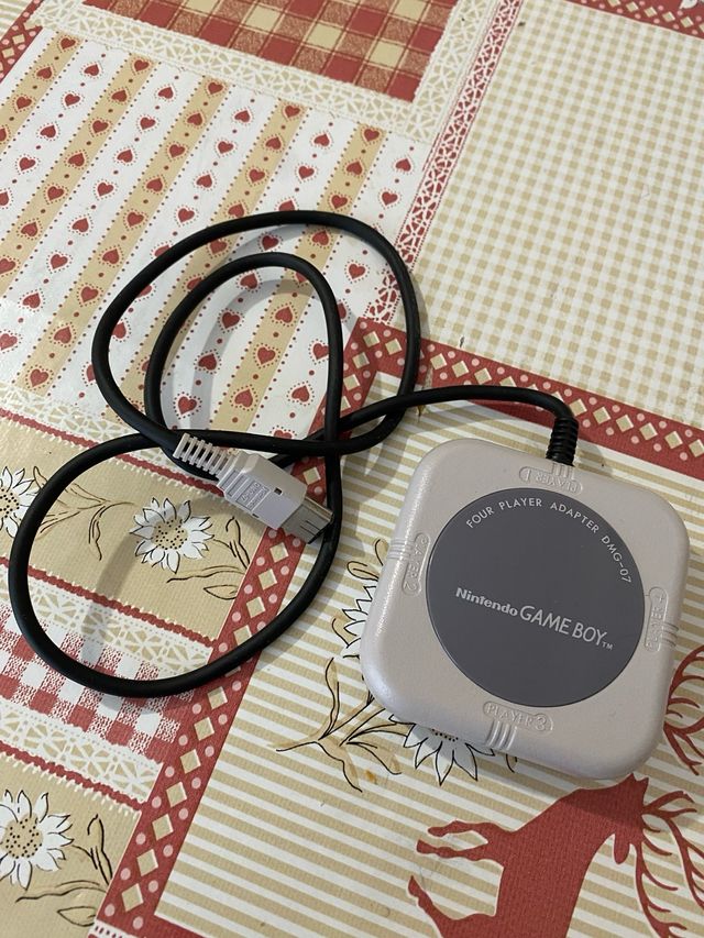 Four player adapter nintendo game boy