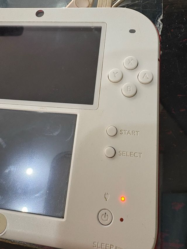 Consola Nintendo y 4 juegos