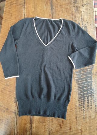 Maglia con bordi dorati