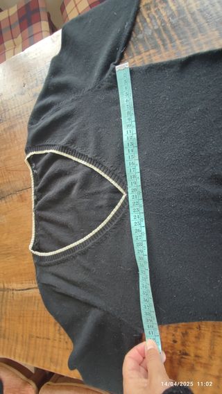 Maglia con bordi dorati