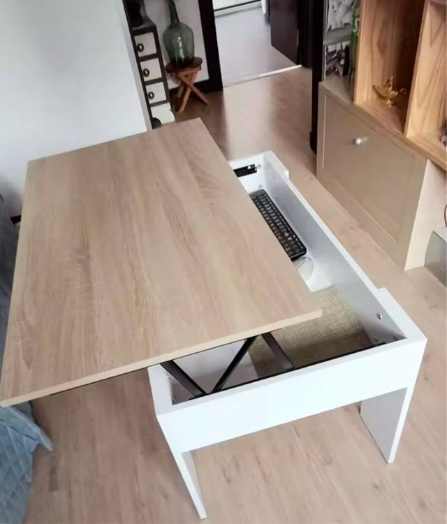 Tavolo centrale sollevabile. Nuovo.