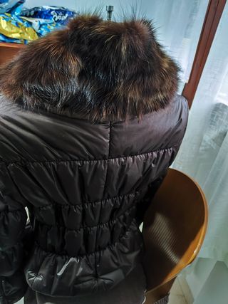 Piumino con pelo 